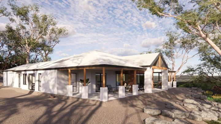 Modern single-story home with a wraparound porch and brick accents